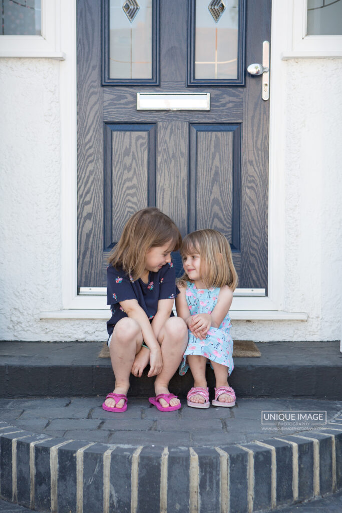 children on doorstep